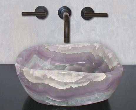terra acqua miramar sink is cut from a single stone - kitchann style